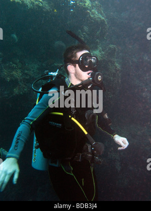 Indonesia Sulawesi Wakatobi National Park underwater young scuba diver learning to dive underwater Stock Photo