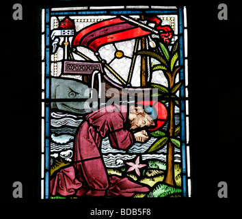 Stained Glass Window of 1872 by Bell & Almond depicting Jonah 2 10 Jonah cast onto dry land Earls Barton Church Northamptonshire Stock Photo