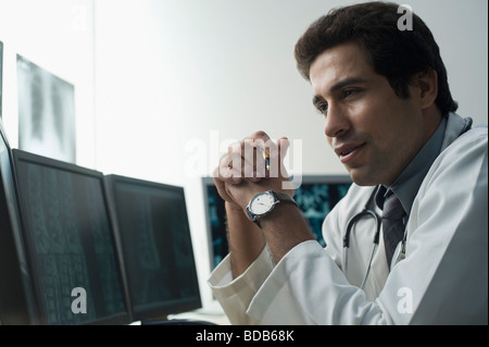 Close-up of a male doctor thinking Stock Photo