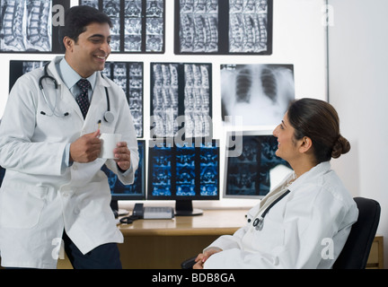Doctors talking in a hospital Stock Photo
