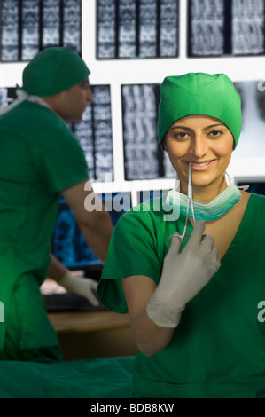 Portrait of a female doctor smiling Stock Photo