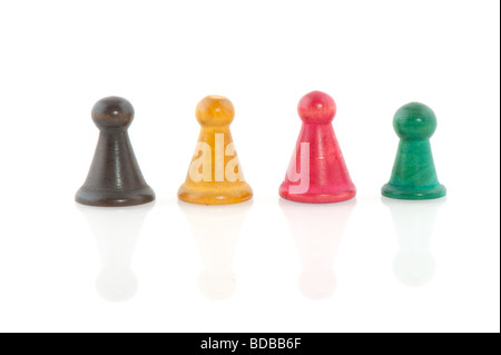 Four vintage pawns in different colors isolated over white Stock Photo