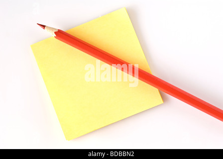 blank post it on white background with red pencil, office supplies Stock Photo