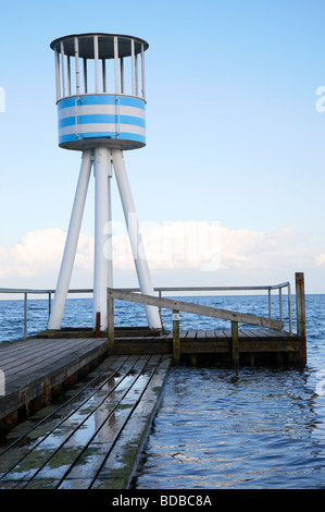 Lifeguard station designed by Arne Jacobsen at the Bellevue Beach resort near Copenhagen in Denmark on a cold day off season. Modernist architect. Stock Photo