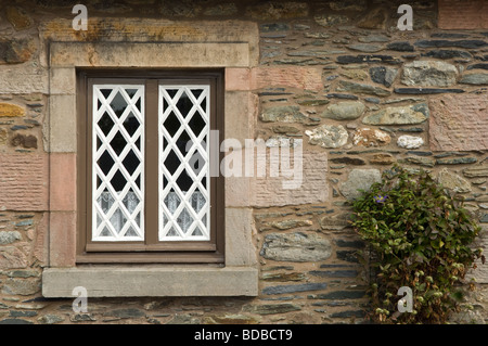 Stone cottages built to house mill and slate workers in the Scottish village of Luss. Stock Photo