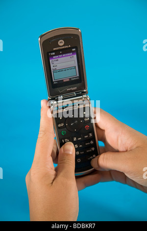 Texting Text Message messaging cell cellular mobile phone Stock Photo