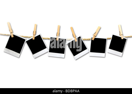 Crooked Old Film Blanks Hanging on a Rope Held By Clothespins Stock Photo