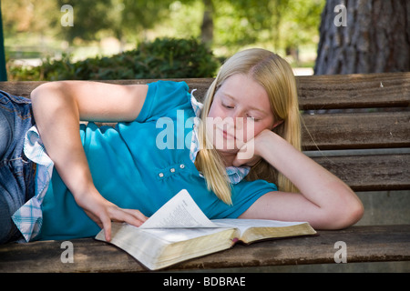 11-13 year old young person people Tween tweens Caucasian Junior high girl  meditating reflecting on God's Word. MR Myrleen Pearson Stock Photo