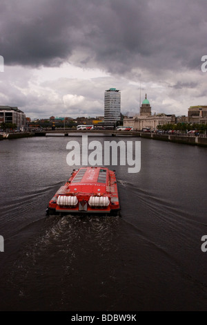 Dublin City Centre as seen from a bridge over the River Liffey. Liberty Hall & The Custom House are on right-hand River-bank Stock Photo