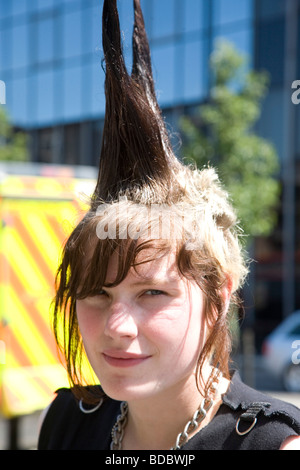 A punk girl 'Rae Ray Riots' with a large Mohican, Shoreditch, London, UK .2009