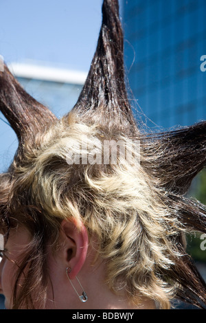 A punk girl 'Rae Ray Riots' with a large Mohican, Shoreditch, London, UK .2009