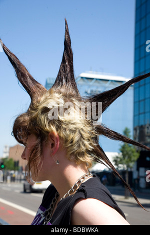 A punk girl 'Rae Ray Riots' with a large Mohican, Shoreditch, London, UK .2009