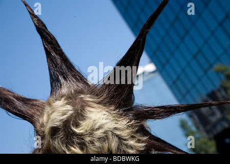 A punk girl 'Rae Ray Riots' with a large Mohican, Shoreditch, London, UK .2009