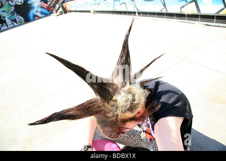 A punk girl 'Rae Ray Riots' with a large Mohican, Shoreditch, London, UK .2009
