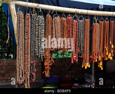 tibetan buddhist  religious beads items objects on sale in the market bazaar near Boudhanath temple shrine buddhist temple Stock Photo