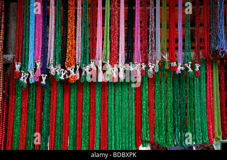 tibetan buddhist  religious beads items objects on sale in the market bazaar near Boudhanath temple shrine buddhist temple Stock Photo