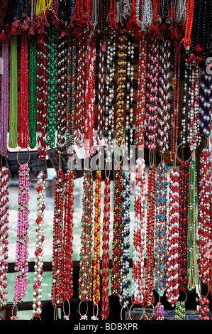 tibetan buddhist  religious beads items objects on sale in the market bazaar near Boudhanath temple shrine buddhist temple Stock Photo