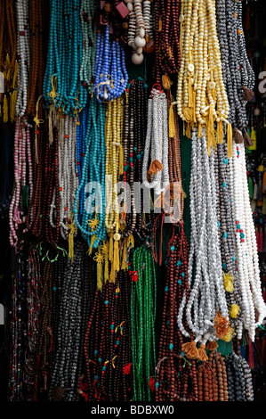 tibetan buddhist  religious beads items objects on sale in the market bazaar near Boudhanath temple shrine buddhist temple Stock Photo