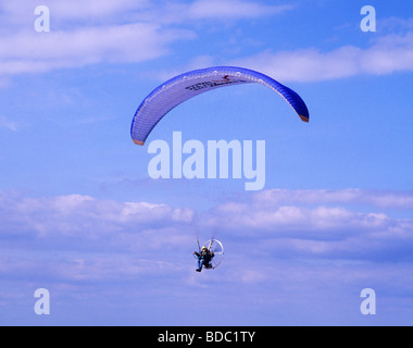 Hang Glider gliding parachute parachutist gliding paraglide glide flying sport leisure active activity open air pursuit Stock Photo