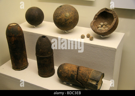 A mixed display of American Civil War artillery shells and shot on ...