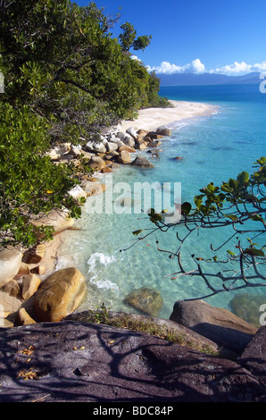 Nudey Beach, Fitzroy Island, rocks break through the crystal clear