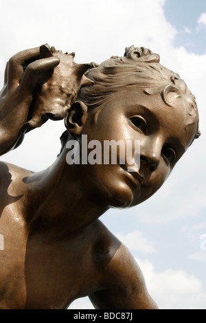 Beautiful statue in  Paris France located on the bridge Pont Alexandre III Stock Photo