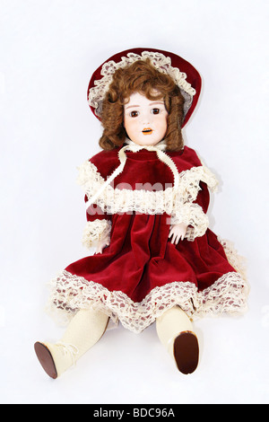 Vintage German porcelain doll girl brown hair with flowing curly hair