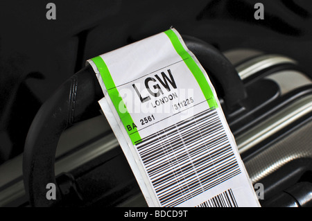 Airline baggage tag on a suitcase showing LGW (Gatwick) Stock Photo