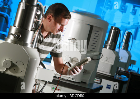 Electronics engineer working in a factory Stock Photo