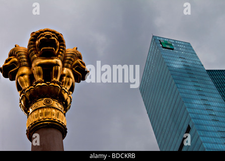Skyscraper in China, Shanghai, with Lion Statue Stock Photo