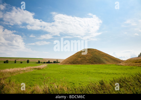 View of the neolithic monument of Silbury Hill and surrounding countryside in Wiltshire, England, UK Stock Photo