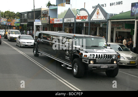 Hummer stretch Limo at Byron Bay during BluesFest Stock Photo
