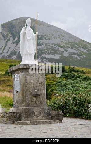 Statue of Saint Patrick at the foot of Croagh Patrick mountain Stock Photo