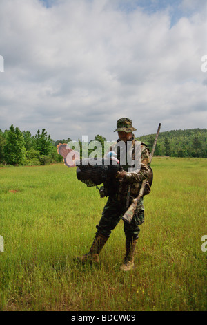 Download Wild Turkey Hunter In Full Camouflage With Face Mask Stock Photo Alamy PSD Mockup Templates