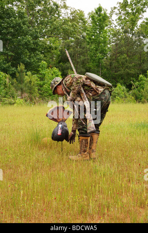 Wild Turkey Hunter In Full Camouflage With Face Mask Stock Photo Alamy