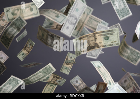 American currency falling Stock Photo