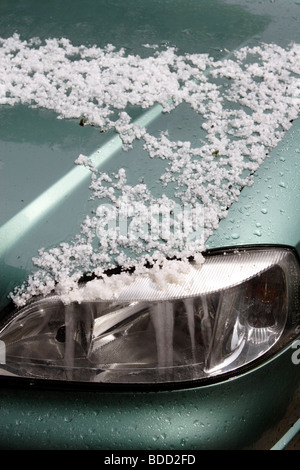 Hailstones on car light close up England , UK Stock Photo