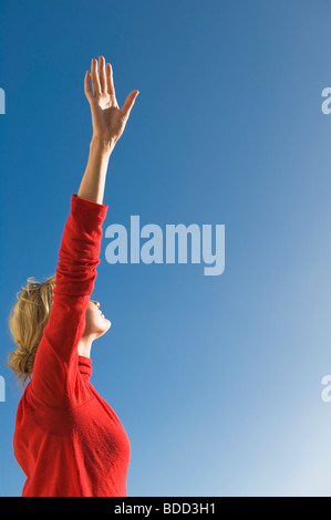 Woman stretching her arms Stock Photo