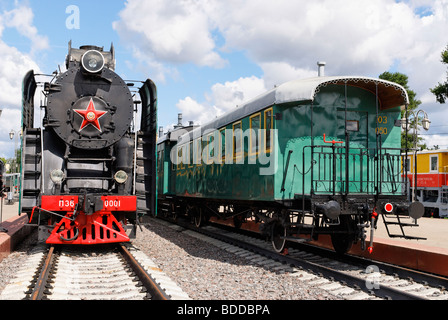 Soviet steam locomotive P36-0001 and retro van built in 1901 by Hungarian factory Dier Stock Photo