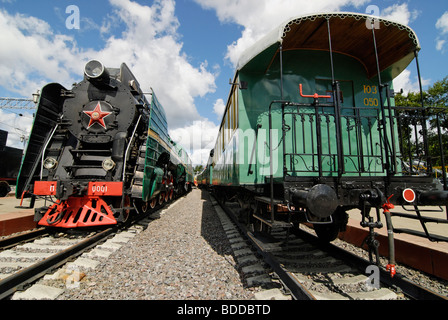 Soviet steam locomotive P36-0001 and retro van built in 1901 by Hungarian factory Dier Stock Photo