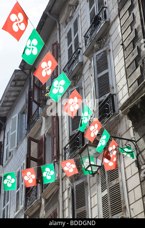 Basque emblem on bunting on rue de Espagne during the Fete de Bayonne in Bayonne France Stock Photo