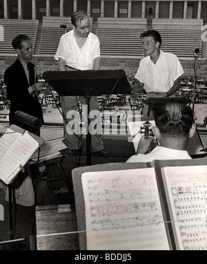 FRANK SINATRA  rehearsing at the Hollywood Bowl in 1943 with Max Steiner, film composer,  as conductor. Stock Photo