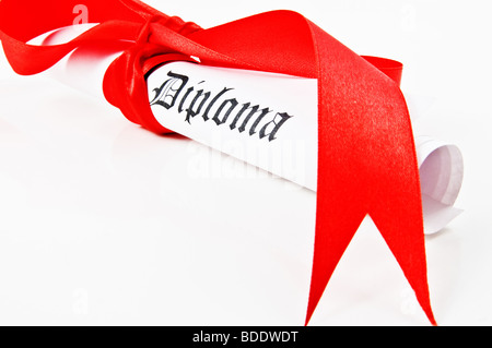 Diploma with red ribbon on white background Stock Photo