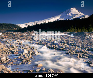 Mount Hood 11,249feet (3,429m) and White River near it's origin on the White River Glacier, Oregon USA Stock Photo