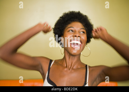 Portrait of young woman expressing emotion Stock Photo