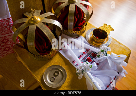 Crown hats and rings before the start of a  russian orthodox wedding Stock Photo