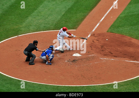 St. Louis Cardinals Albert Pujols tries unsuccessfully to break a bat over  his knee after popping out against the Milwaukee Brewers in the first  inning at Busch Stadium in St. Louis on