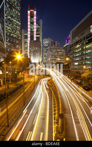 High rise building and car trails at night in Central District, Chung Wan, Hong Kong, China. Stock Photo