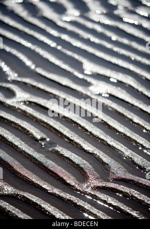 Wave patterns on sand Stock Photo