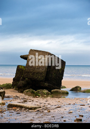 World War II Concrete Pill Box On Fraisthorpe Beach, East Yorkshire Stock Photo